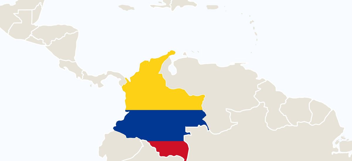 Zu sehen ist der Umriss von Kolumbien inklusive der Flagge des Landes.